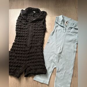 2 rompers , black and baby blue